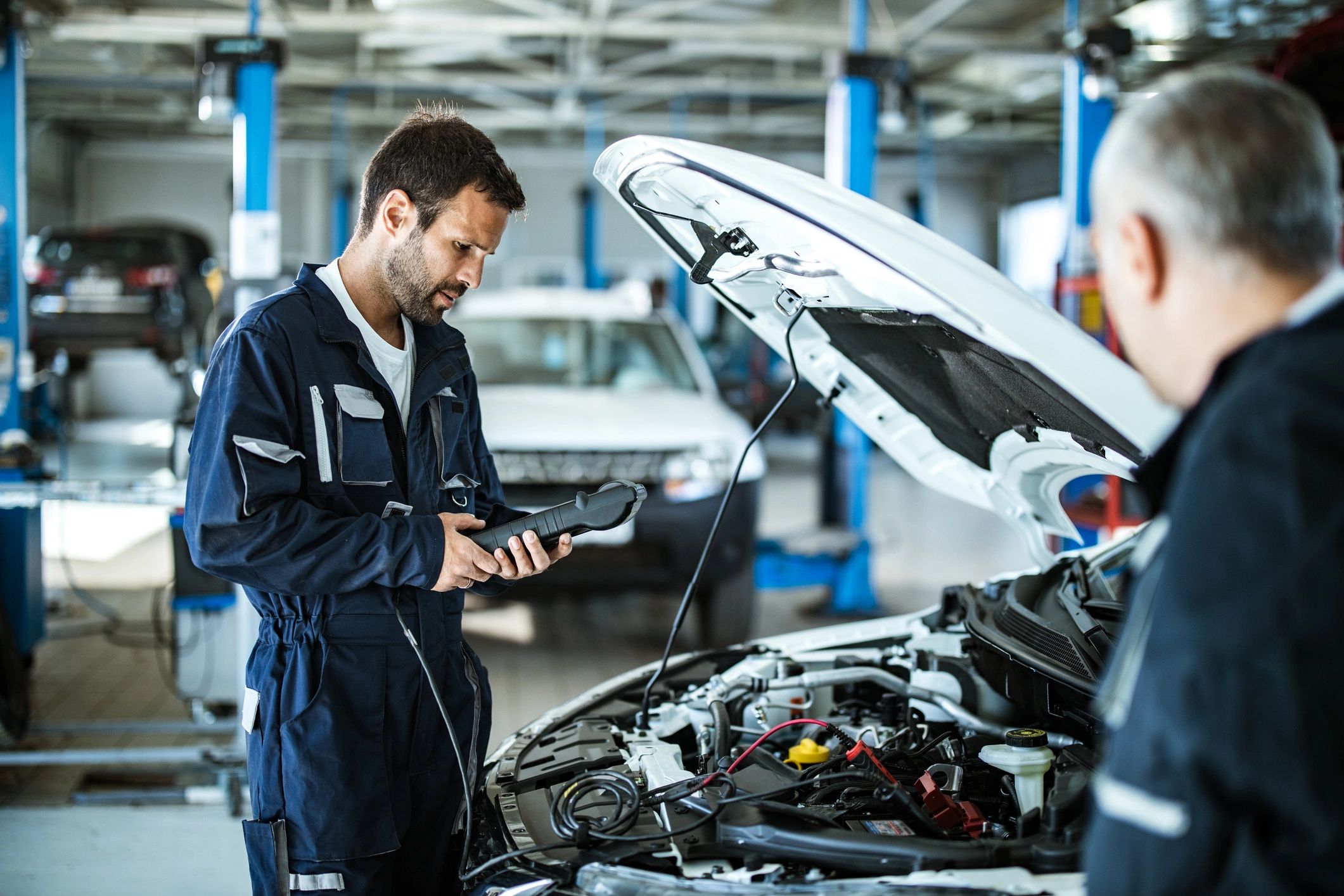 mechanic working with diagnostic tools