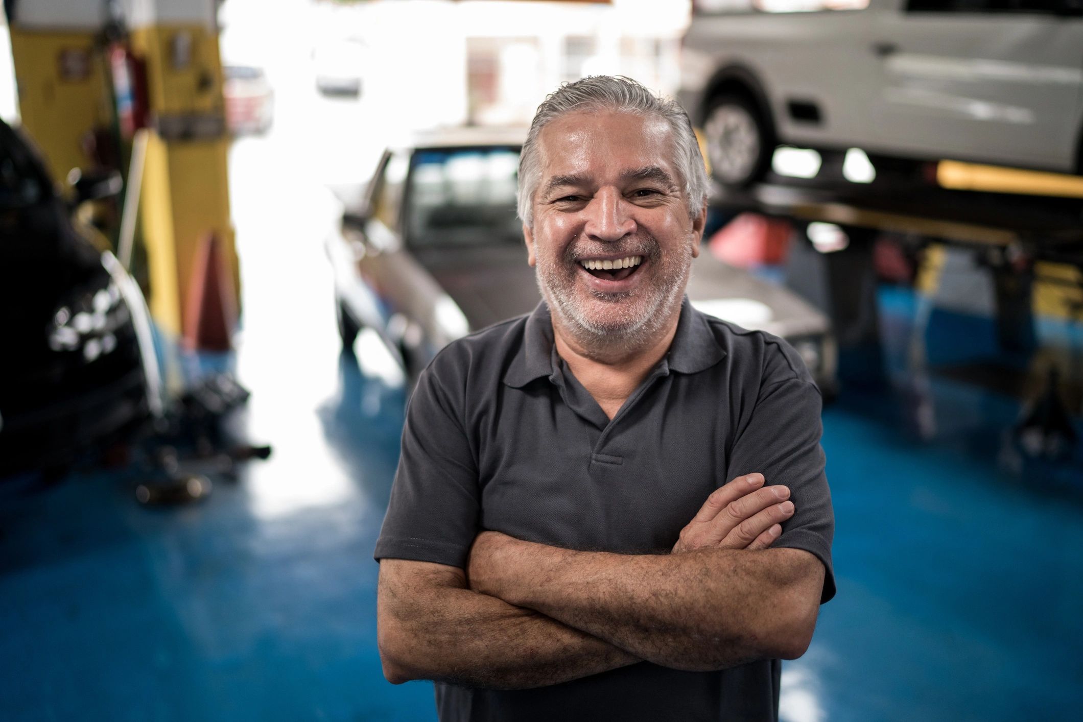 happy car owner at auto repair shop