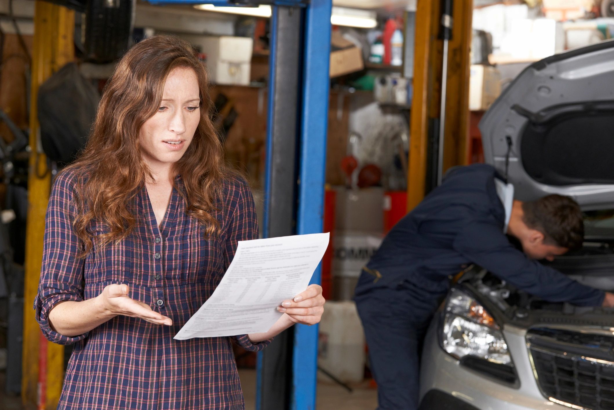 customer reading car maintenance tips